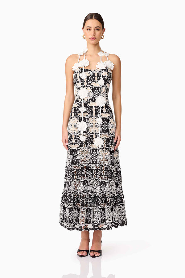 Brunette model wearing the Jolie Floral Midi Dress in Black front shot 