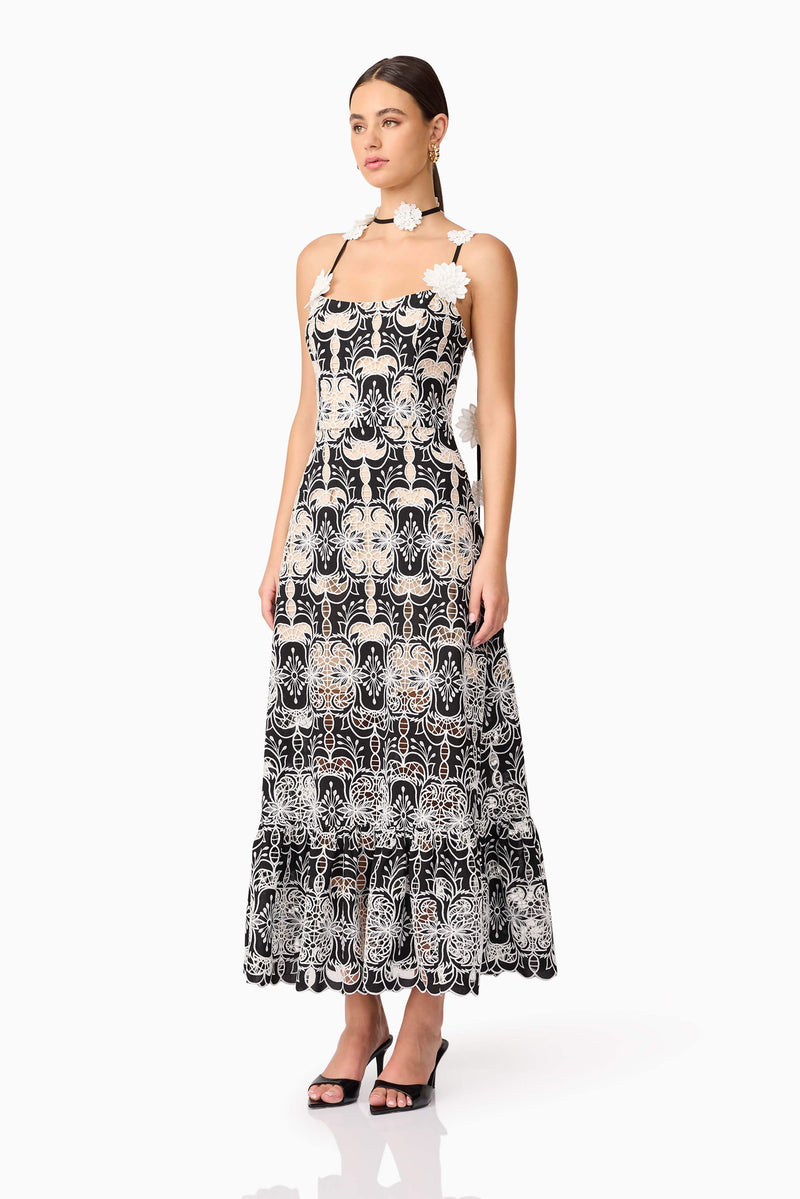 Brunette model wearing Jolie Floral Midi Dress in Black side shot