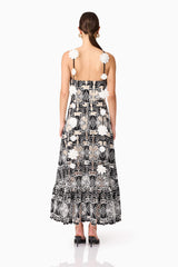 Brunette model wearing Jolie Floral Midi Dress in Black back shot