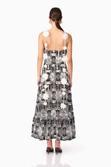 Brunette model wearing the Jolie Floral Midi Dress in Black back shot 