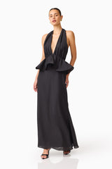 Fiorina Halter Peplum Gown in Black with a plunging neckline & peplum detailing posed shot