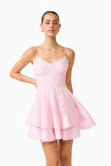 Fiorina Tiered Mini Dress in Pale Pink with lace  trim & v-neckline close up posed shot