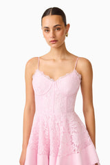 Fiorina Tiered Mini Dress in Pale Pink with lace  trim & v-neckline close up shot