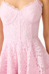Fiorina Tiered Mini Dress in Pale Pink with lace trim & v-neckline detail shot