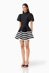 Ninette Puff Sleeve Mini Dress in Black & White with high neckline & knit fabrication side shot