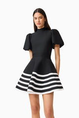 Ninette Puff Sleeve Mini Dress in Black & White with high neckline & knit fabrication close up shot