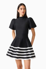 Ninette Puff Sleeve Mini Dress in Black & White with high neckline & knit fabrication detail shot