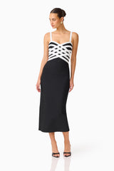 Ninette Coulum Midi Dress in Black & White with a sweetheart neckline posed shot