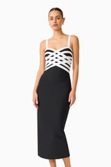 Ninette Coulum Midi Dress in Black & White with a sweetheart neckline mid shot