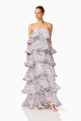 Rosaria Tiered Gown in Purple Floral with a square neckline & georgette fabrication posed looking away shot