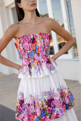 Brunette model wearing the Alice Tiered Gown in Ombre Floral content shot