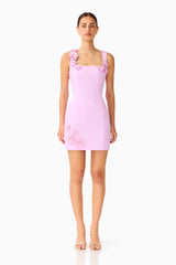 Brunette model wearing the Trompe 3D Mini Dress in Purple  front shot 