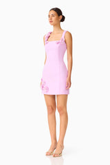 Brunette model wearing the Trompe 3D Mini Dress in Purple  side shot 