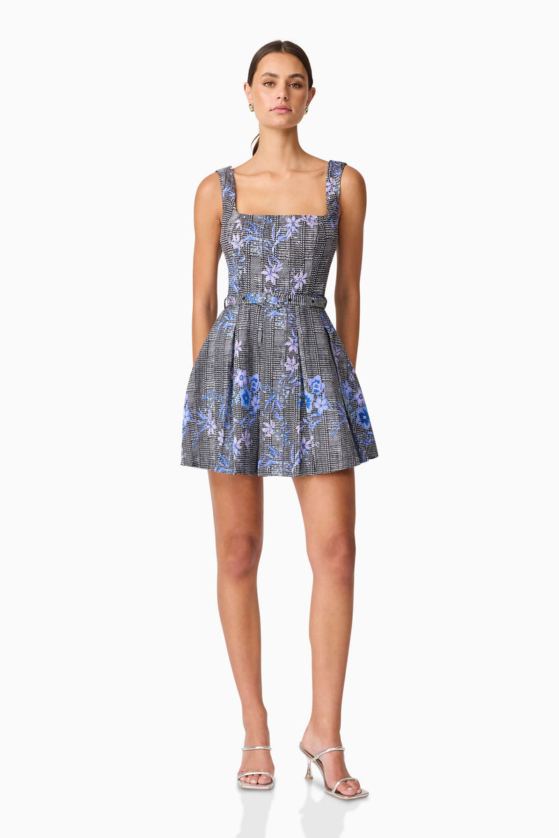 Brunette model wearing Allana Jacquard Mini Dress in Black & Blue Floral posed shot