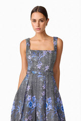 Brunette model wearing Allana Jacquard Mini Dress in Black & Blue Floral close up shot