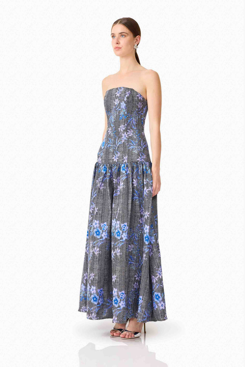 Brunette model wearing Allana Jacquard Strapless Gown in Black & Blue Floral side shot 