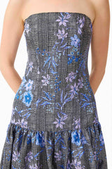 Brunette model wearing Allana Jacquard Strapless Gown in Black & Blue Floral detail shot 