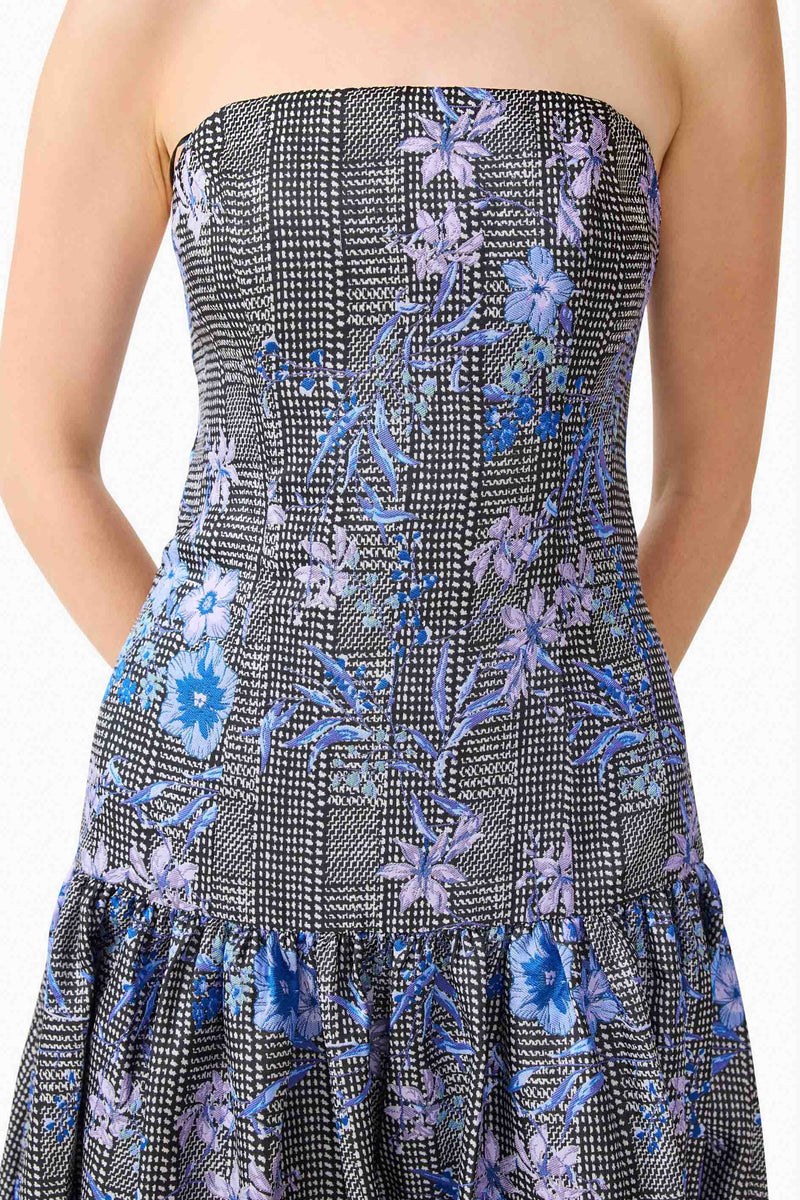 Brunette model wearing Allana Jacquard Strapless Gown in Black & Blue Floral detail shot 