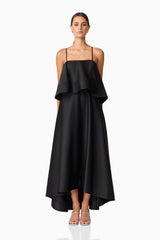 Brunette model wearing Reyna Tiered Maxi Dress in Black front shot