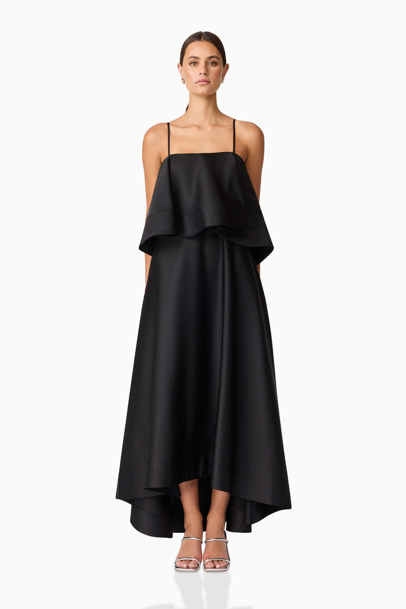 Brunette model wearing Reyna Tiered Maxi Dress in Black front shot