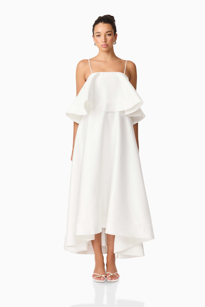 Brunette model wearing Reyna Tiered Maxi Dress in White front shot