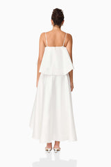 Brunette model wearing Reyna Tiered Maxi Dress in White back shot
