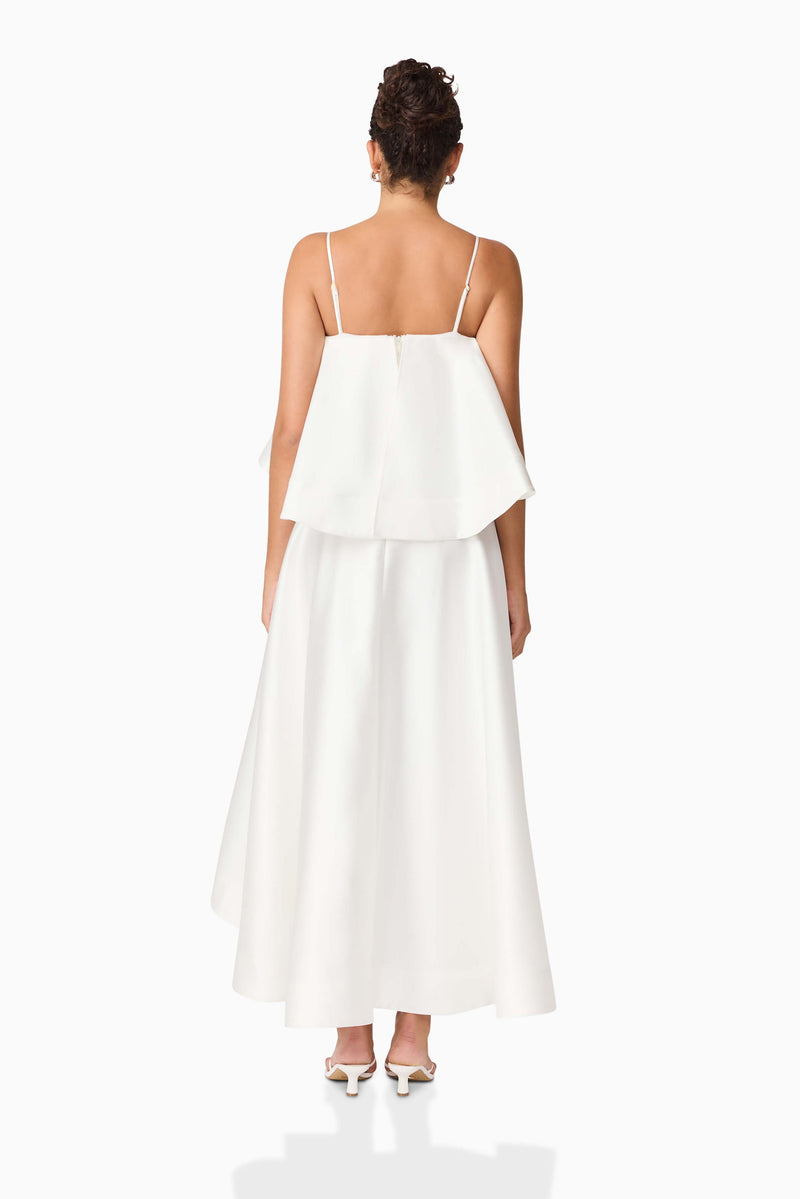 Brunette model wearing Reyna Tiered Maxi Dress in White back shot