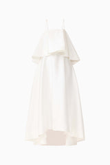 Brunette model wearing Reyna Tiered Maxi Dress in White ghost shot