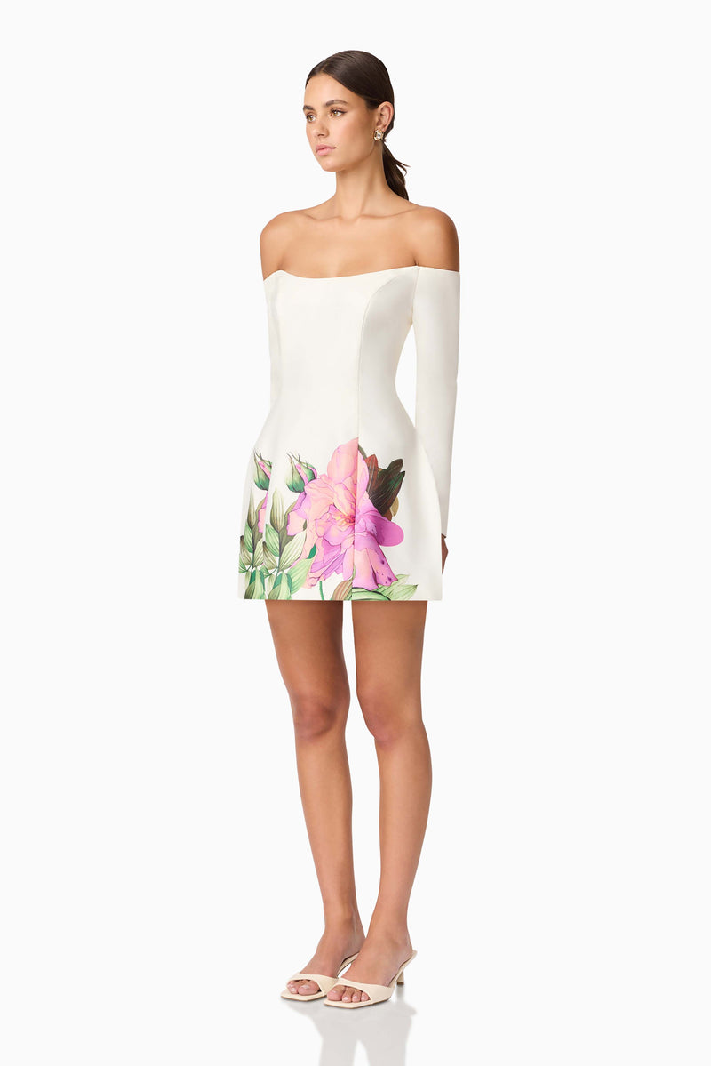 Brunette model wearing Azelie Off The Shoulder Mini Dress in White side shot