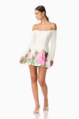 Brunette model wearing Azelie Off The Shoulder Mini Dress in White posed shot