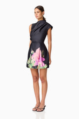 Brunette model wearing Azelie Asymmetrical Mini Dress in Black side shot