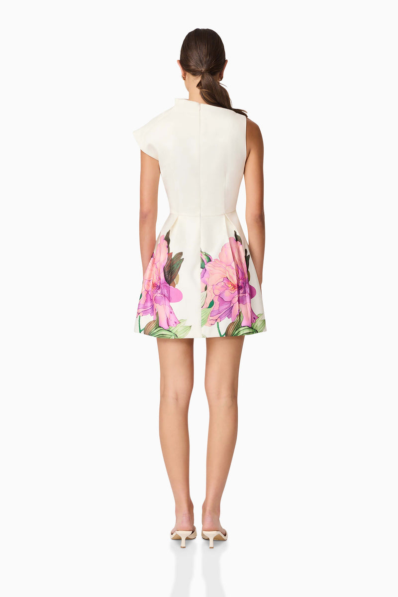 Brunette model wearing Azelie Asymmetrical Mini Dress in White back shot