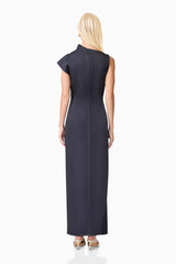 Blonde model wearing the Azelie Asymmetrical Gown in Black back shot 