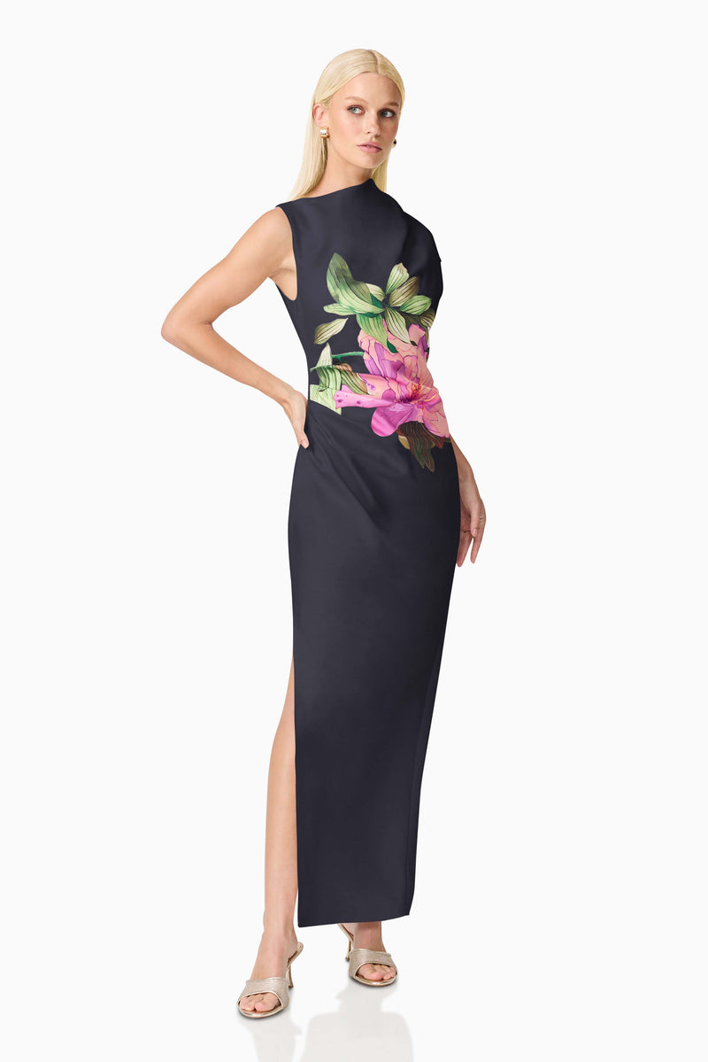Blonde model wearing the Azelie Asymmetrical Gown in Black posed shot 