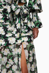 Brunette model wearing Rosey Long Sleeve Set in Black Floral bottom detail shot