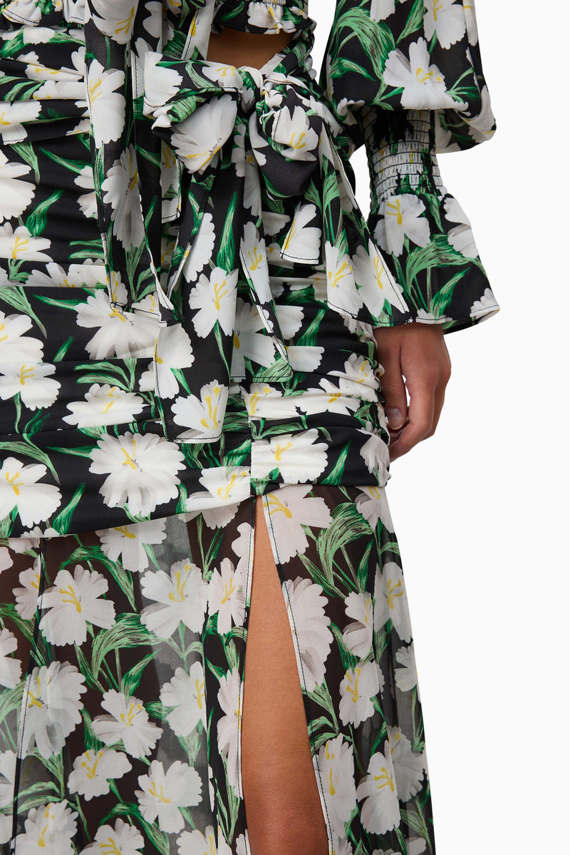 Brunette model wearing Rosey Long Sleeve Set in Black Floral bottom detail shot
