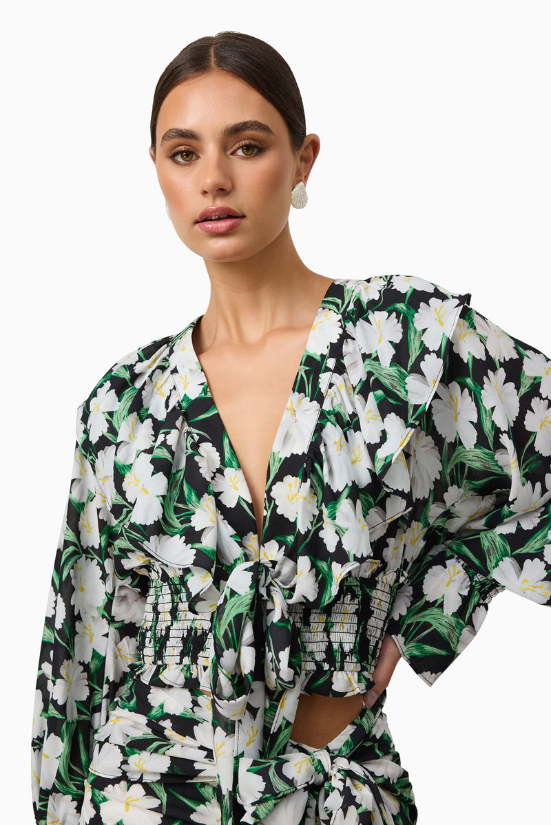 Brunette model wearing Rosey Long Sleeve Set in Black Floral close up shot
