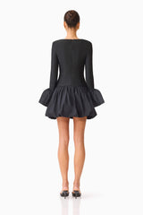 Brunette model wearing the Theodora Long Sleeve Mini Dress in Black back shot