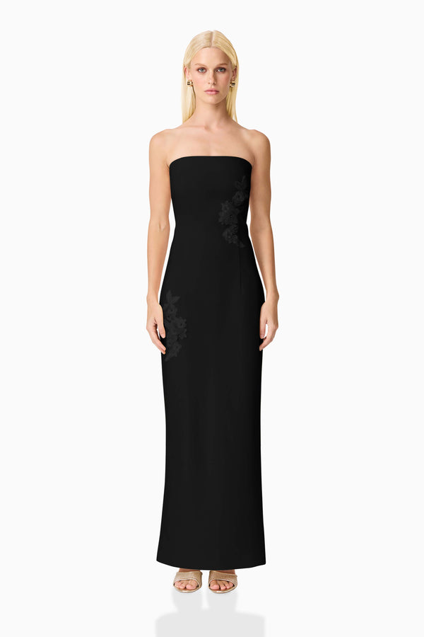 Blonde model wearing Evee Strapless Maxi Dress in Black front shot