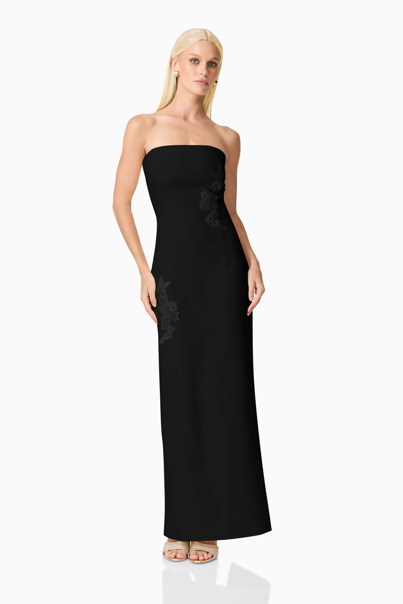 Blonde model wearing Evee Strapless Maxi Dress in Black posed shot