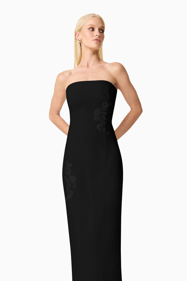 Blonde model wearing Evee Strapless Maxi Dress in Black close up shot