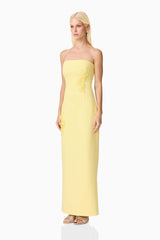 Blonde model wearing Evee Strapless Maxi Dress in Yellow side shot