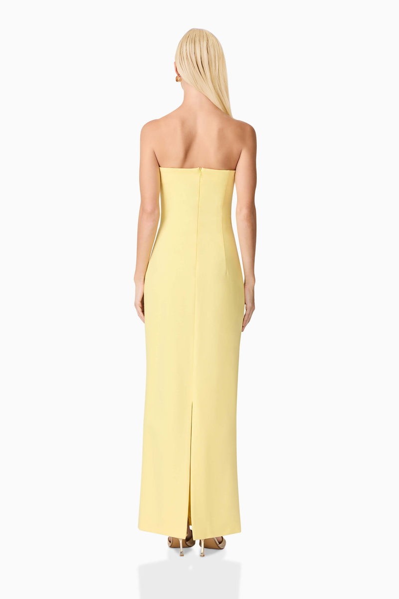 Blonde model wearing Evee Strapless Maxi Dress in Yellow back shot