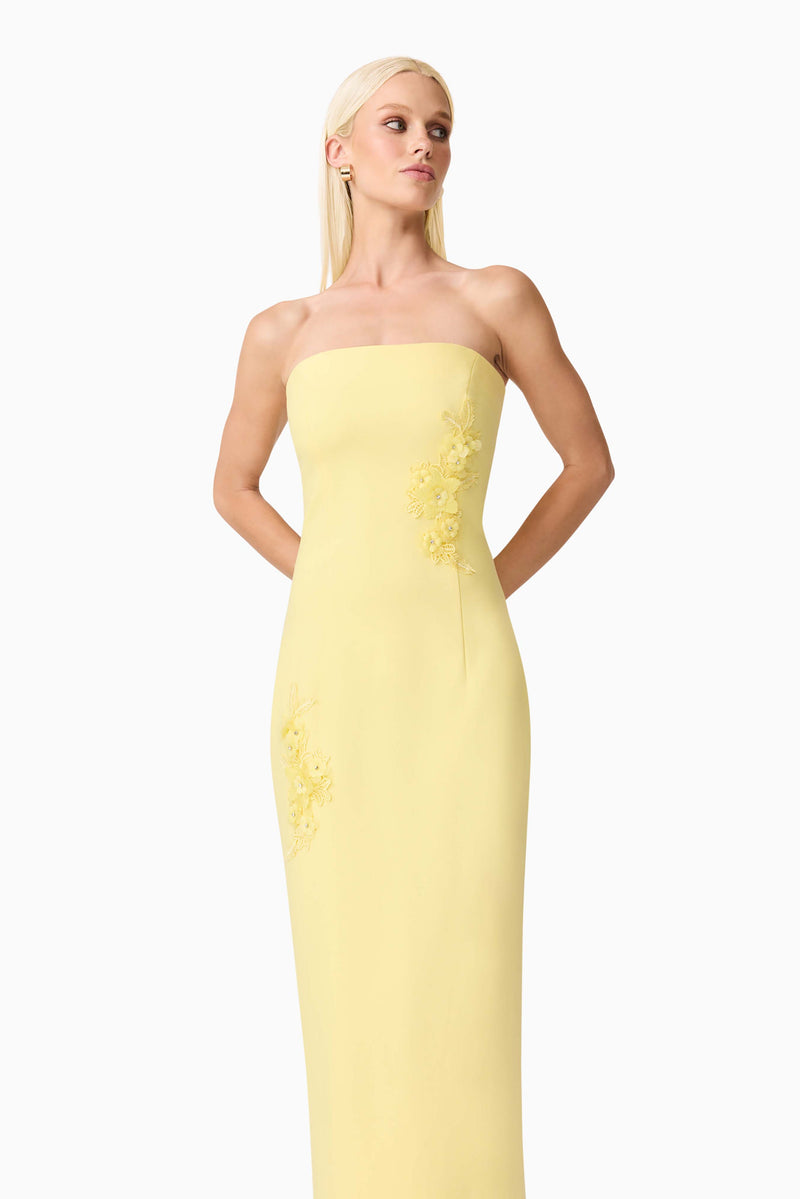 Blonde model wearing Evee Strapless Maxi Dress in Yellow close up looking away shot