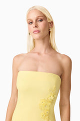 Blonde model wearing Evee Strapless Maxi Dress in Yellow close up shot