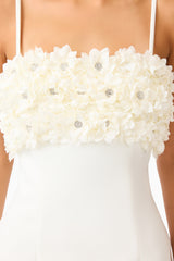 Solenne Party Mini Dress in White with a 3D floral detail shot