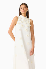 Solenne Halter Maxi Dress in White with 3D floral detail & relaxed fit close up shot