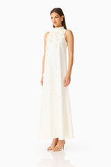Solenne Halter Maxi Dress in White with 3D floral detail & relaxed fit side shot