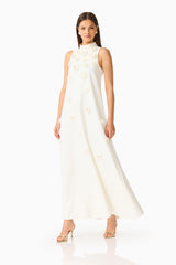 Solenne Halter Maxi Dress in White with 3D floral detail & relaxed fit posed shot