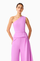 Solenne Jumpsuit in Purple with a one shoulder neckline close up shot